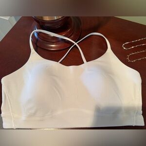CALIA by Carrie Underwood White sports bra w/ medium support and straps back.